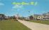 Hotel lined Ocean Pathway Ocean Grove, New Jersey Postcard